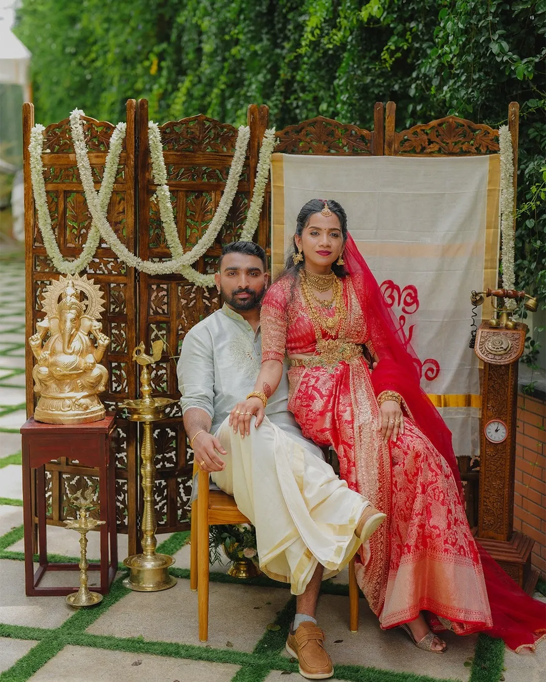 Bride and groom seated together after their ceremony