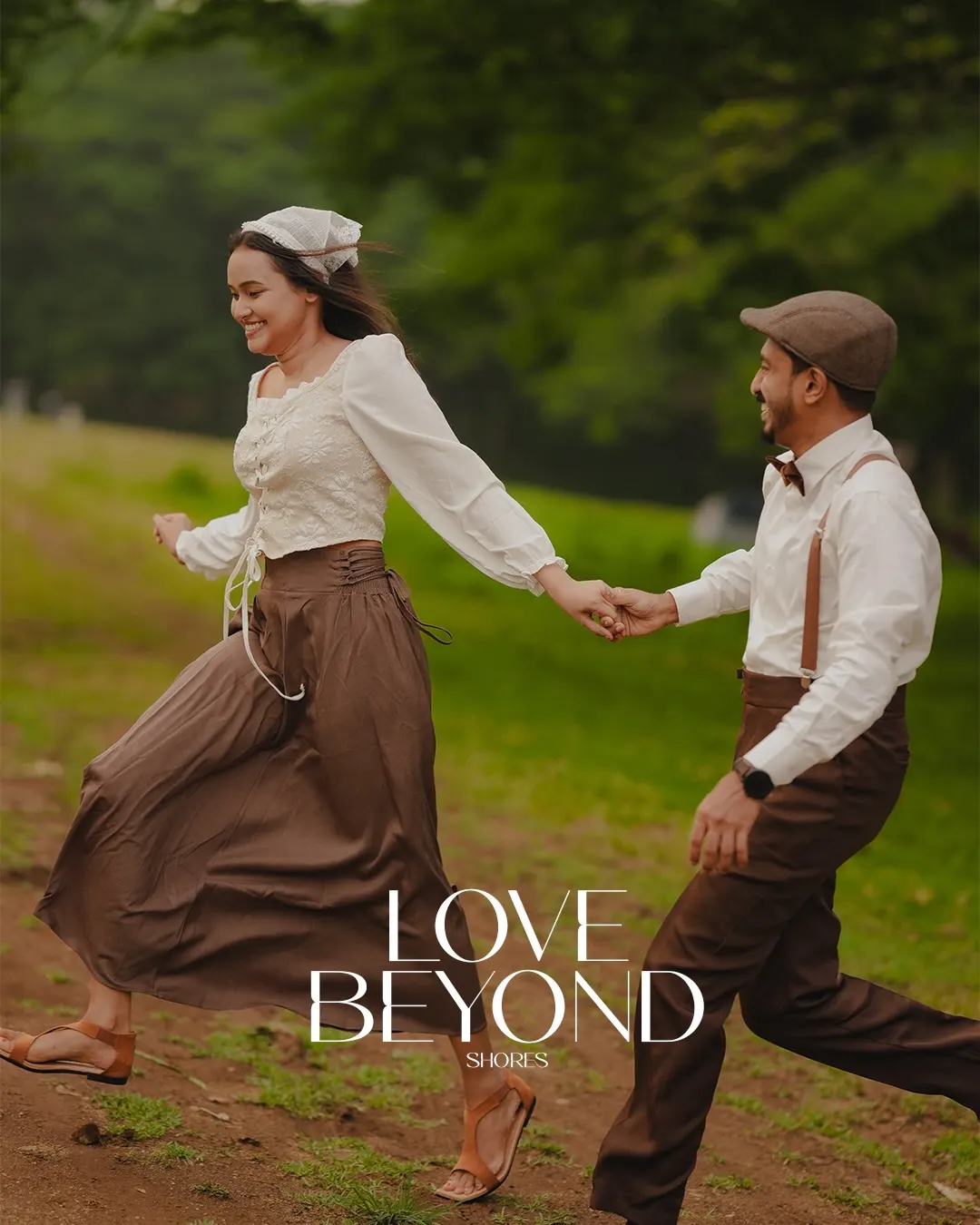Couple running hand in hand through a green field